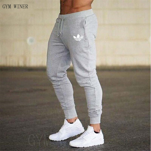 New Men Joggers Brand Male Trousers Casual Pants Sweatpants Jogger grey Casual Elastic cotton gyms Fitness Brand logo Sweatpants