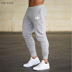 New Men Joggers Brand Male Trousers Casual Pants Sweatpants Jogger grey Casual Elastic cotton gyms Fitness Brand logo Sweatpants